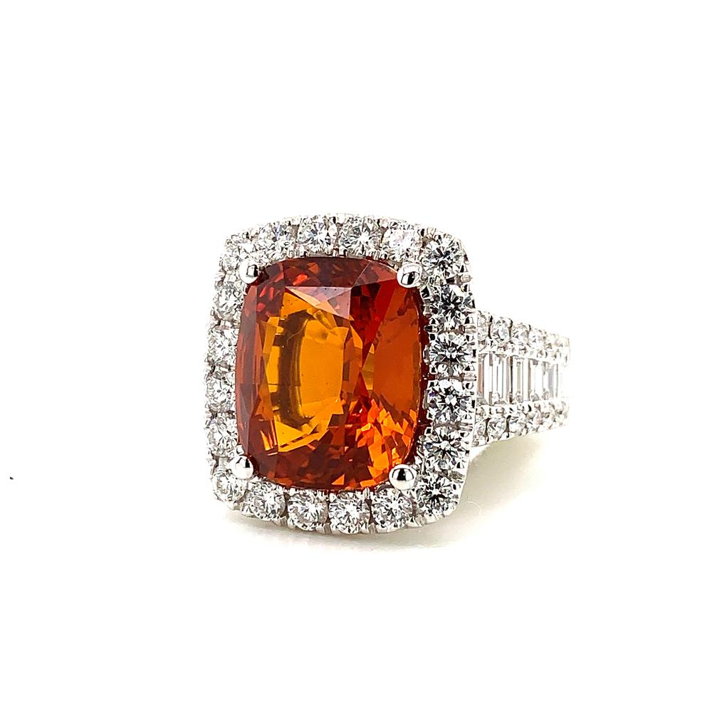 18k white gold ring with a CDC certified orange sapphire