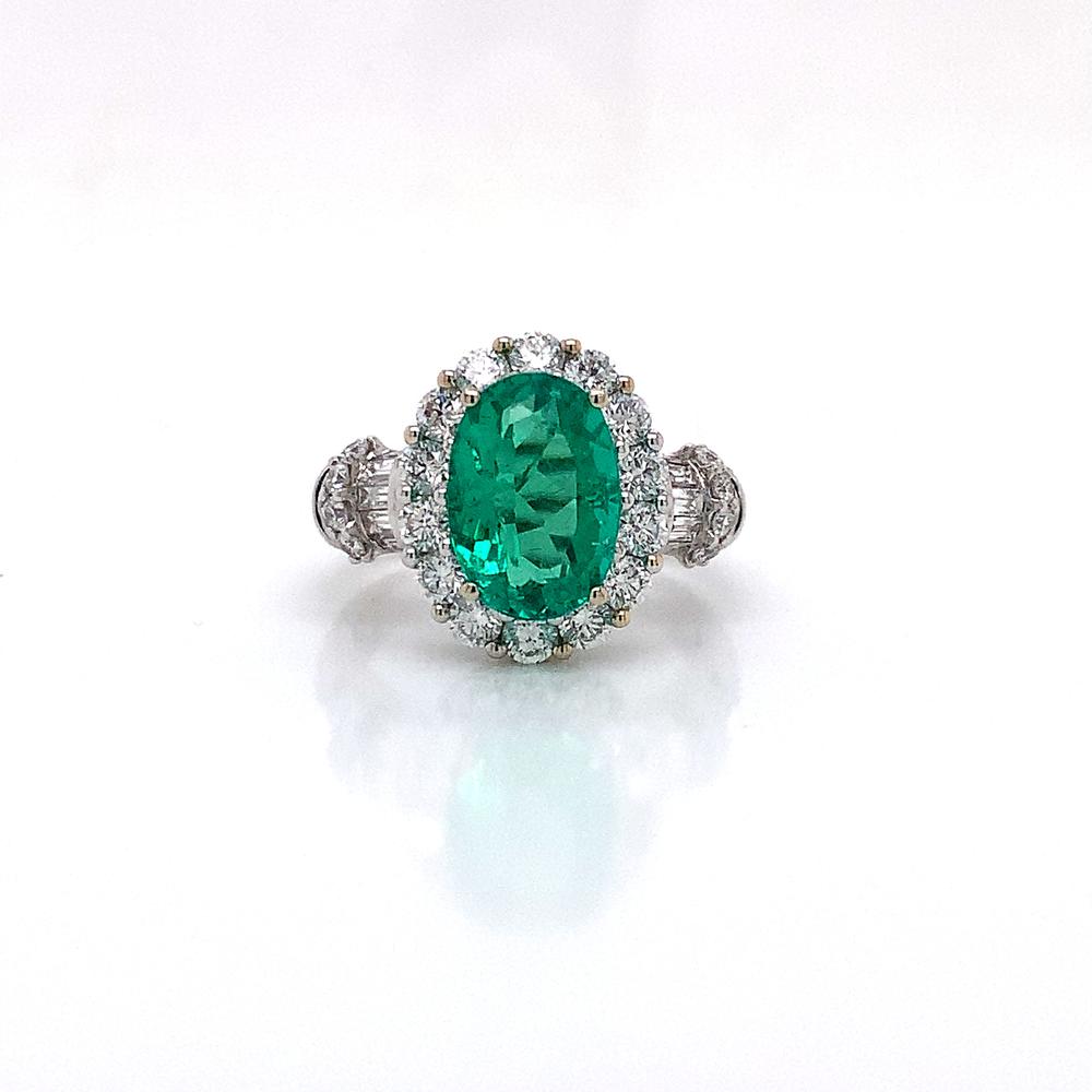 18k white gold ring with a CDC certified Colombian emerald