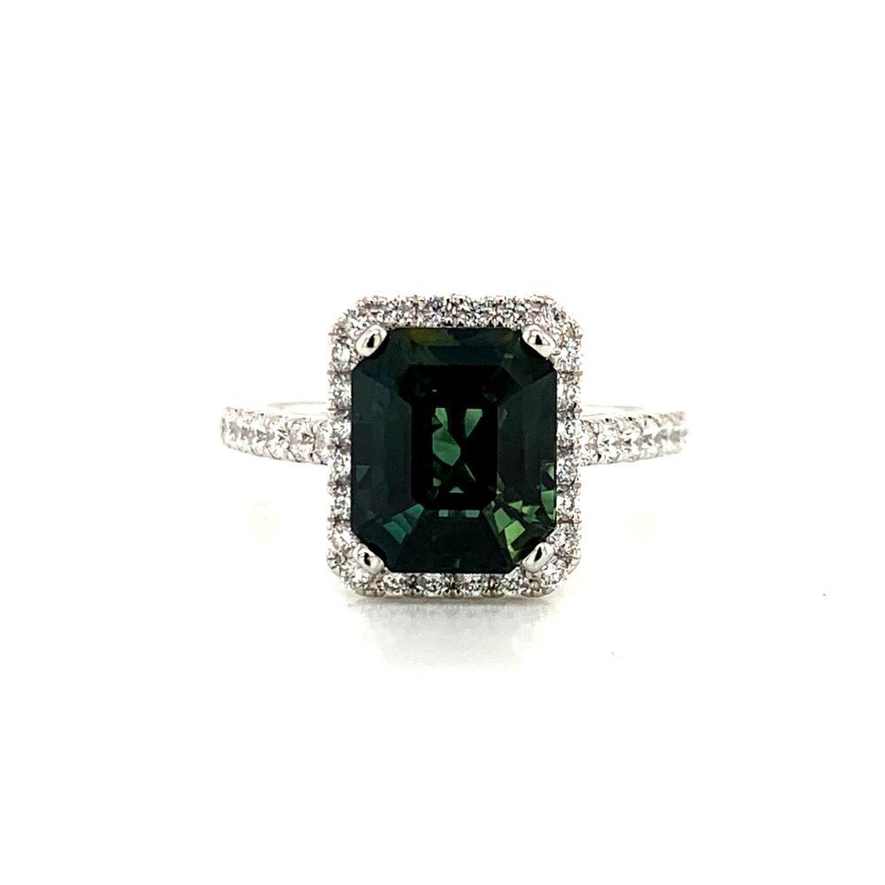 18k ring with a GIA certified green sapphire